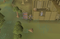 Emote clue - wave south fence lumber yard.png